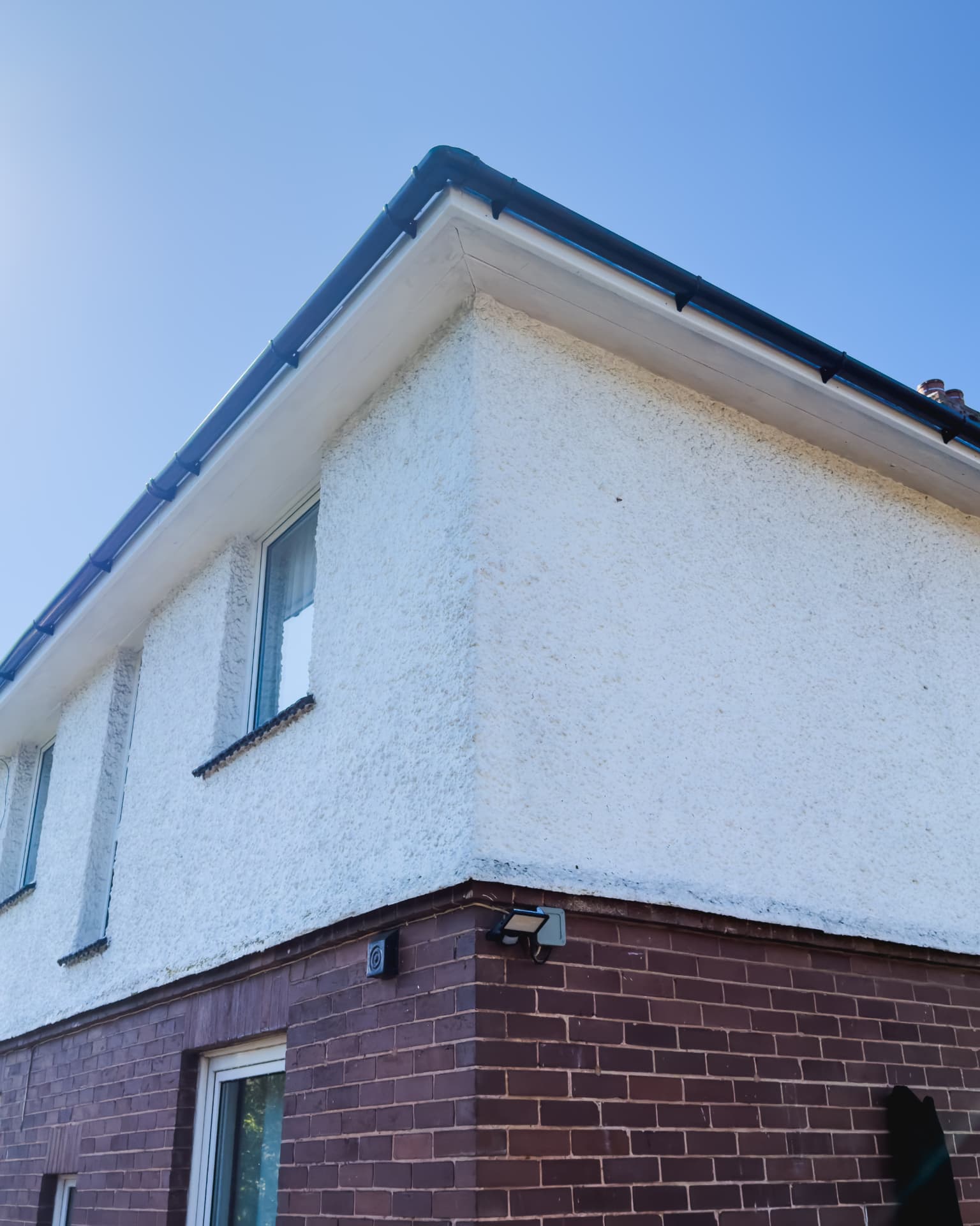 Same roofline washed clean after OutWash fascia, soffit and gutter cleaning