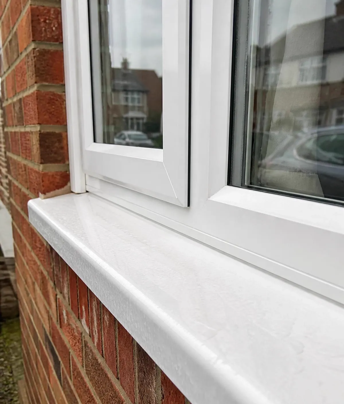 Freshly cleaned window glass, frame and sill on a home in Exeter